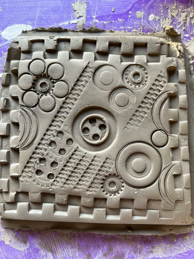 Finished clay tile ready for painting